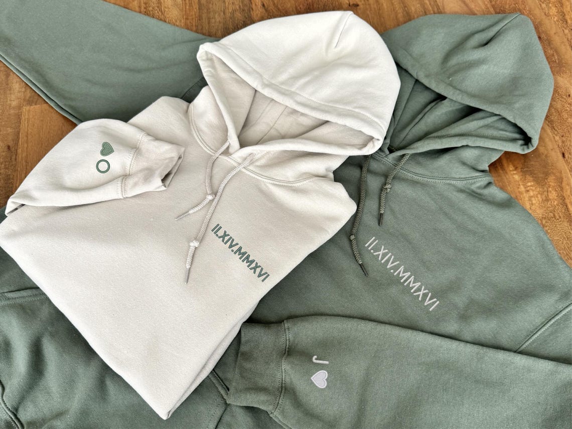 Custom embroidered Roman numeral wedding date hoodie from FlowertownWeddings on Etsy