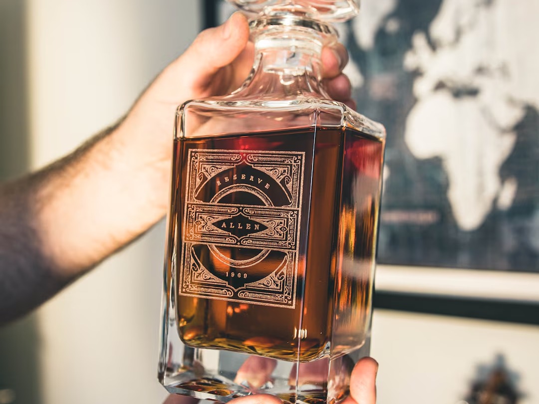 Engraved glass whiskey decanter with matching tumblers, from SwankyBadger