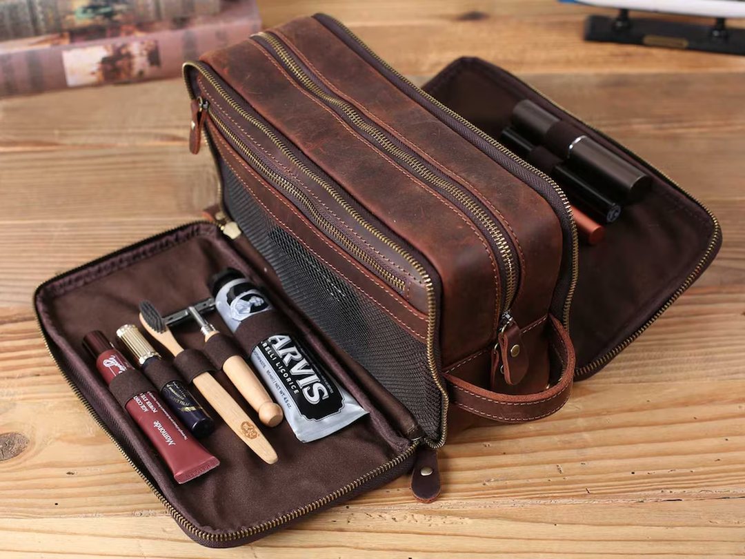 Waterproof leather toiletry bag with a monogram, from JackLeatherStudio