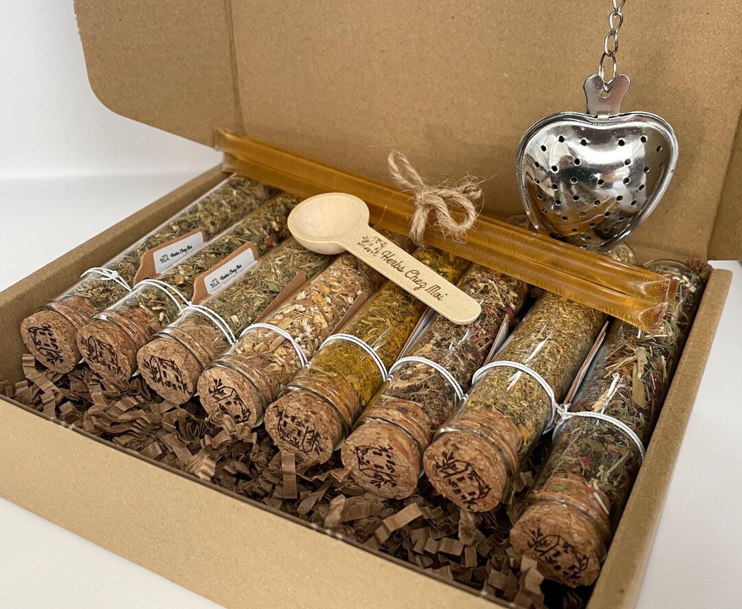Loose leaf herbal tea sampler set in labelled tins, a consumable Christmas gift for a sister