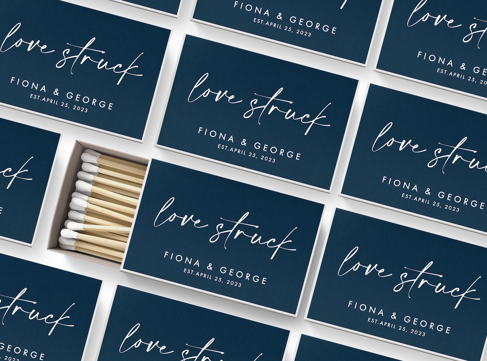Set of personalized wedding matchboxes in navy with gold foil names from WhiteConfettiBox on Etsy