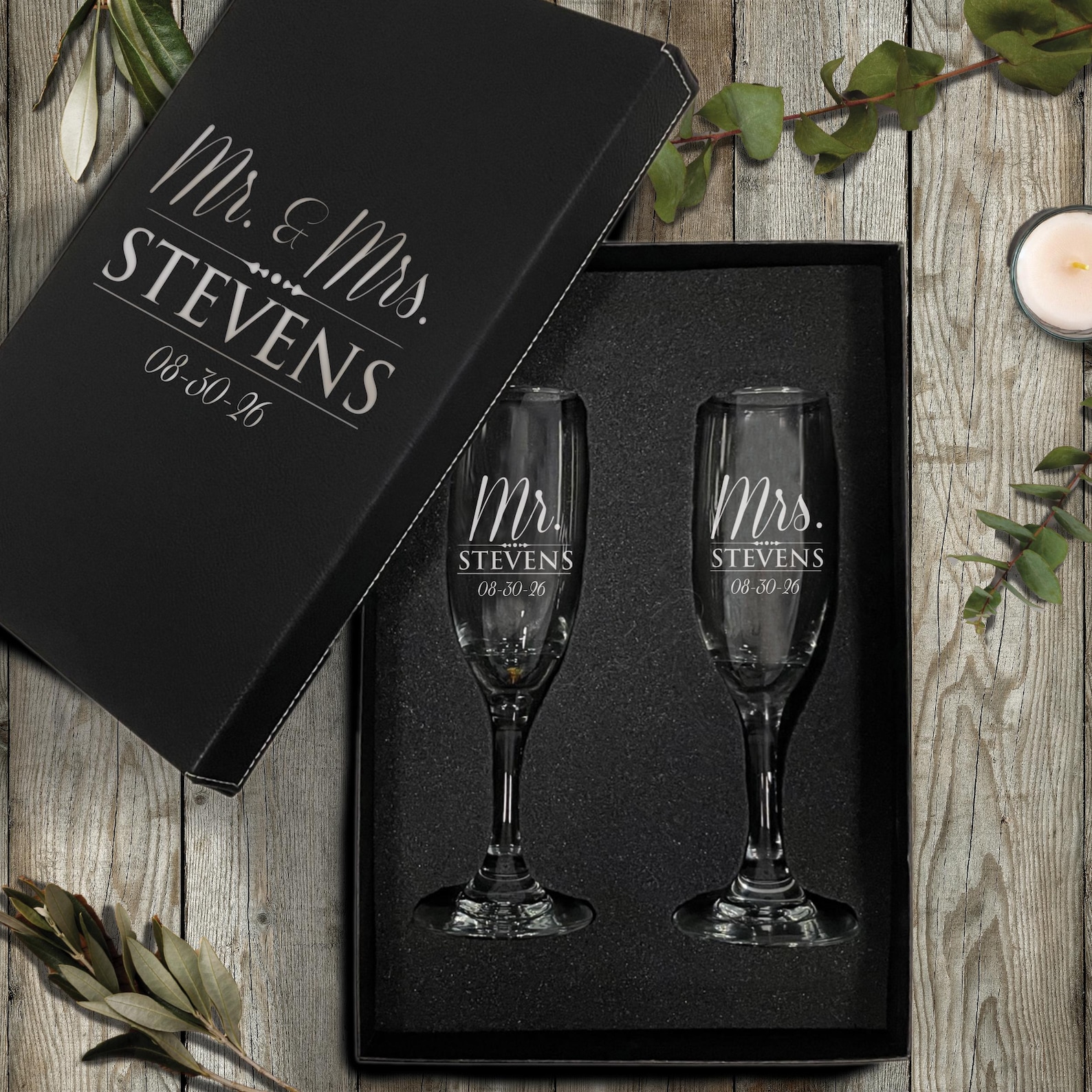 Engraved Mr and Mrs champagne toasting flutes in a black gift box from MyPersonalMemories on Etsy