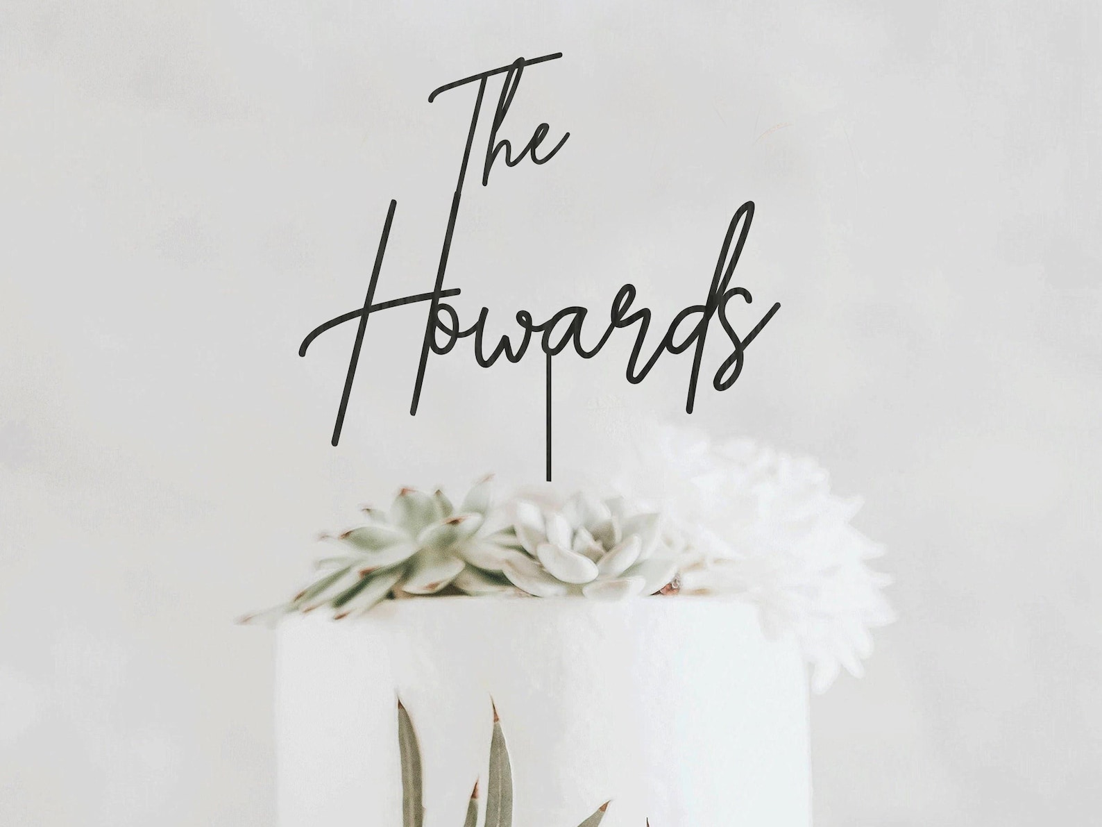 Custom script last-name wedding cake topper in gold mirror acrylic from TheLocalKrafter on Etsy
