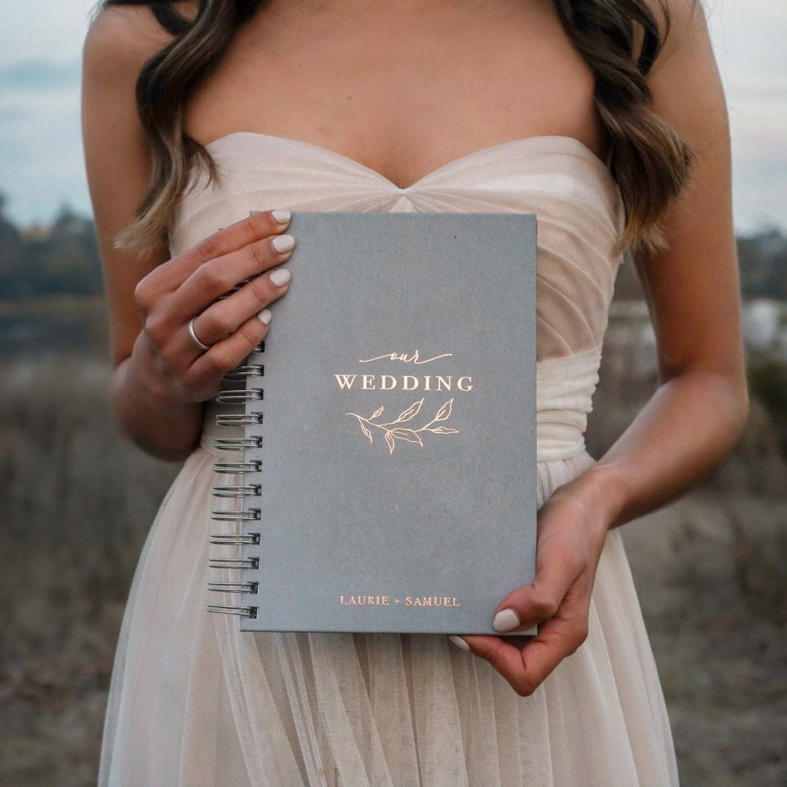 Hardcover floral wedding planner book with gold-foil-style lettering from ThePaperMemory on Etsy