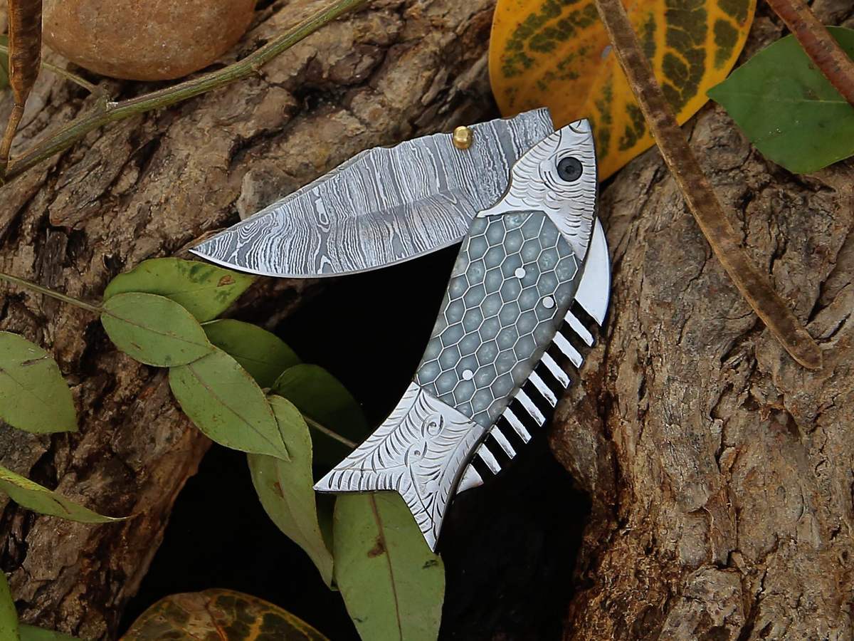 BamsiBlades fish-shaped metal folding pocket knife with a patterned blade and grey handle, a groomsmen gift on Etsy