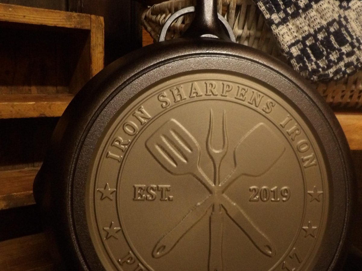Legacymachinedesign black cast iron skillet machined with Iron Sharpens Iron on the base, a groomsmen gift on Etsy