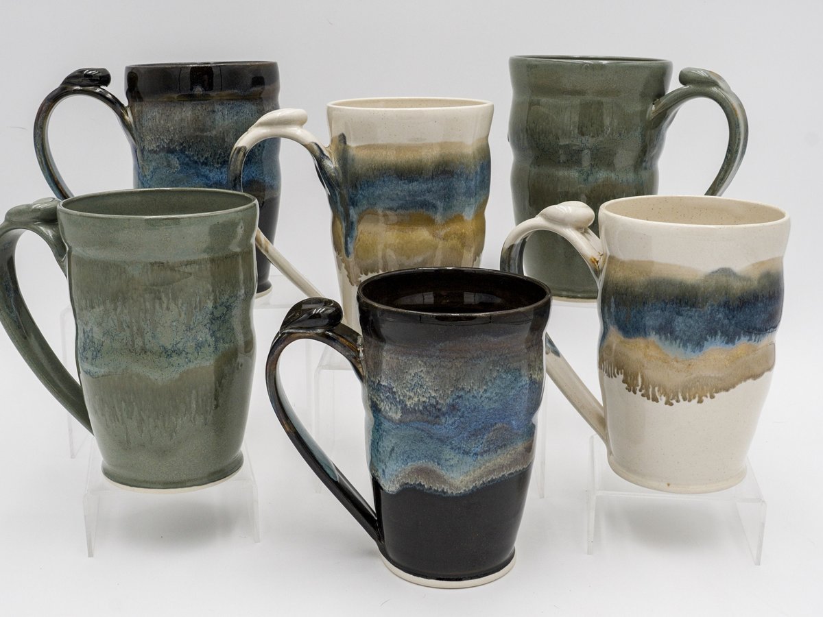 LightSquarePottery pair of handmade 16 oz stoneware mugs with thumb buttons, on Etsy