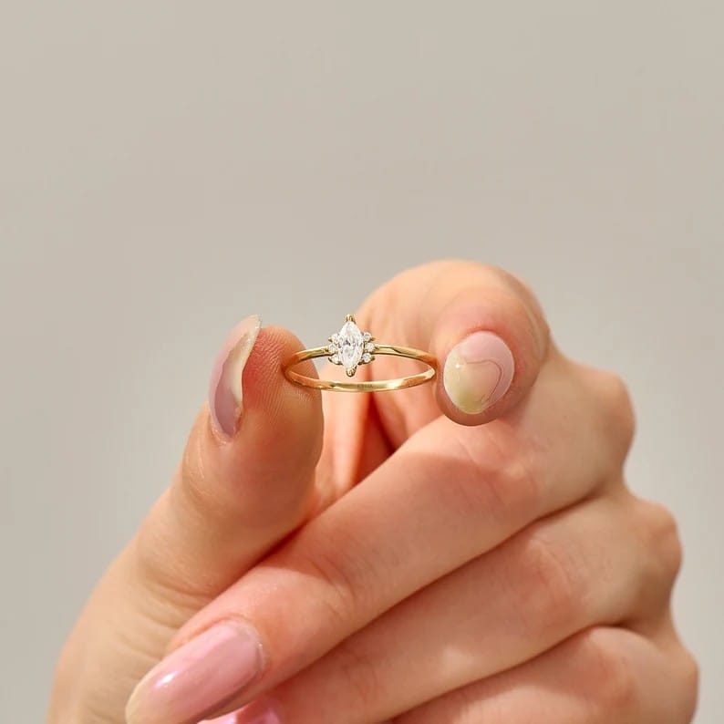 OliviaMooreJewelry — 14K Gold Tiny Marquise Moissanite Ring — best for Best marquise cut