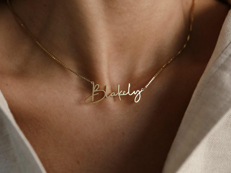 Personalized dainty script name necklace in gold from CaitlynMinimalist on Etsy